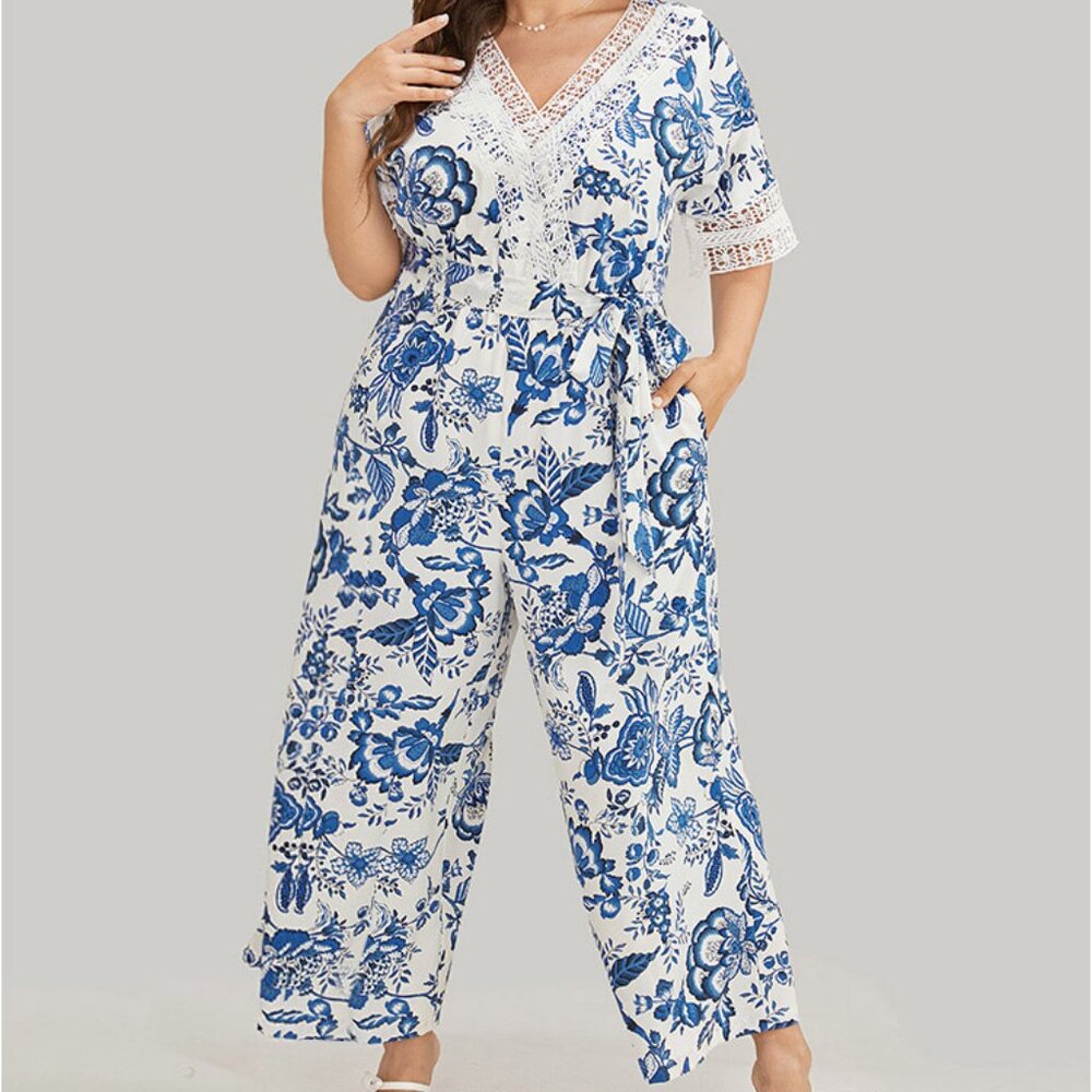 Floral Jump Suit Size Medium with Pockets NWT